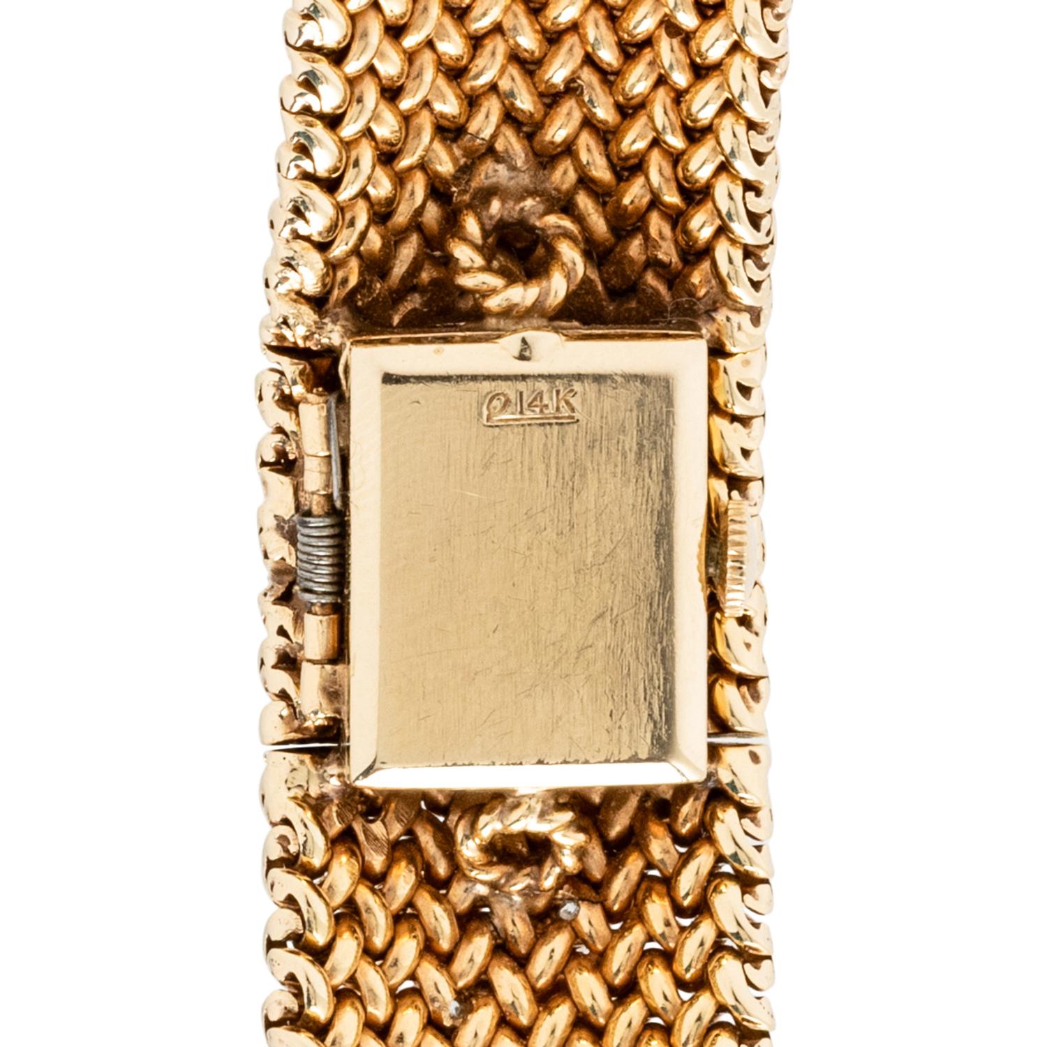 BOUCHE, YELLOW GOLD AND DIAMOND SURPRISE WATCH