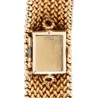 BOUCHE, YELLOW GOLD AND DIAMOND SURPRISE WATCH