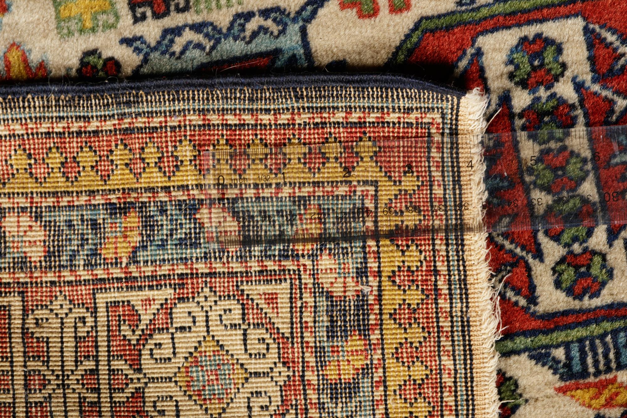 A Perepedil Ivory-Ground Wool Rug
