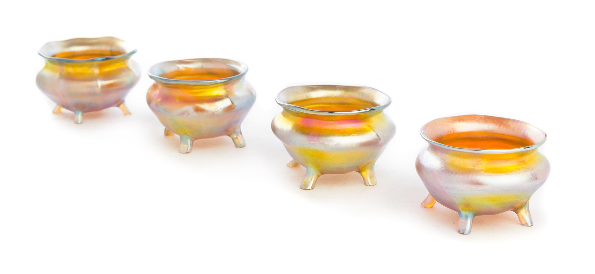 Tiffany Studios, a group of four Favrile glass salts