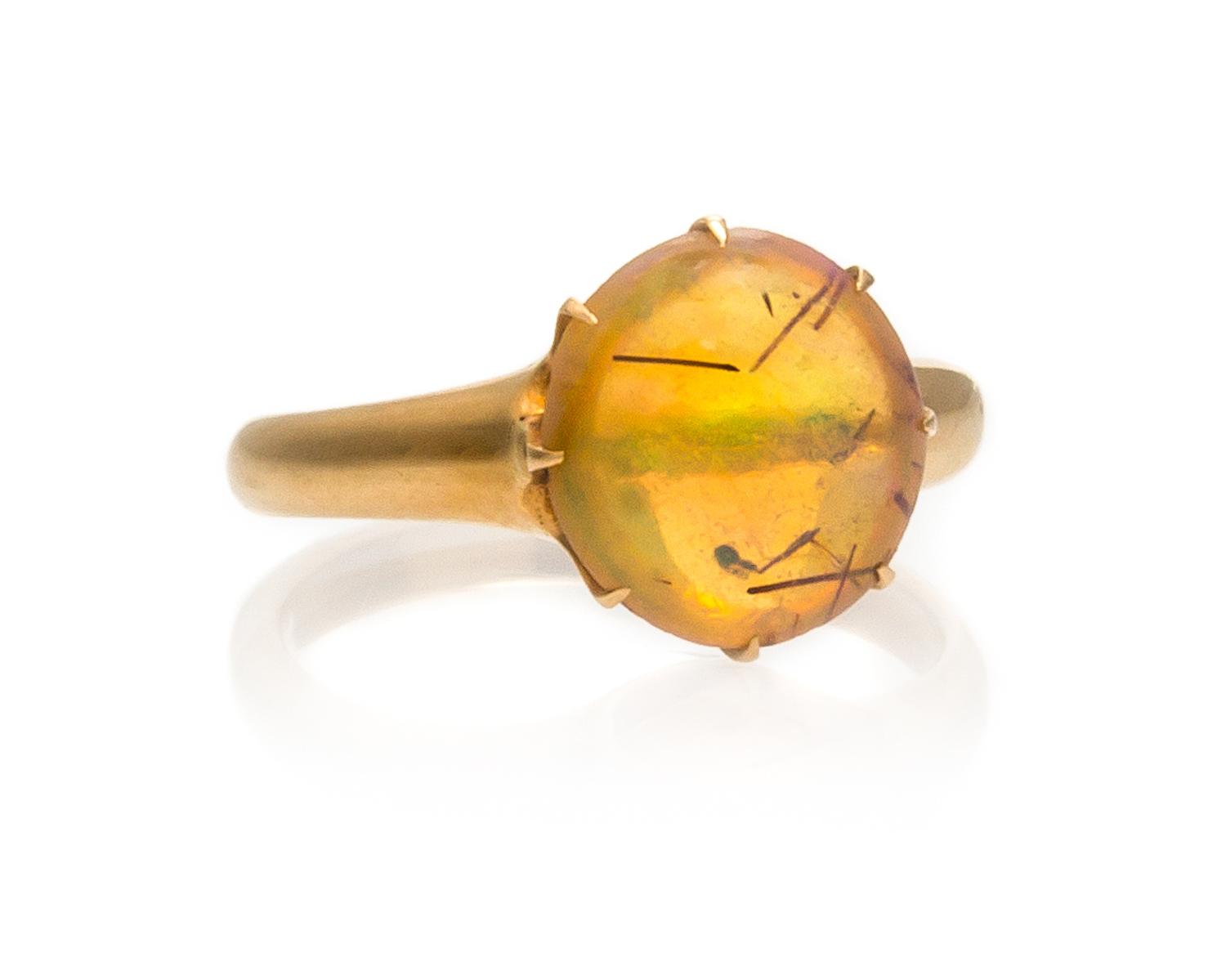 A Yellow Gold and Fire Opal Ring, 2.60 dwts.
