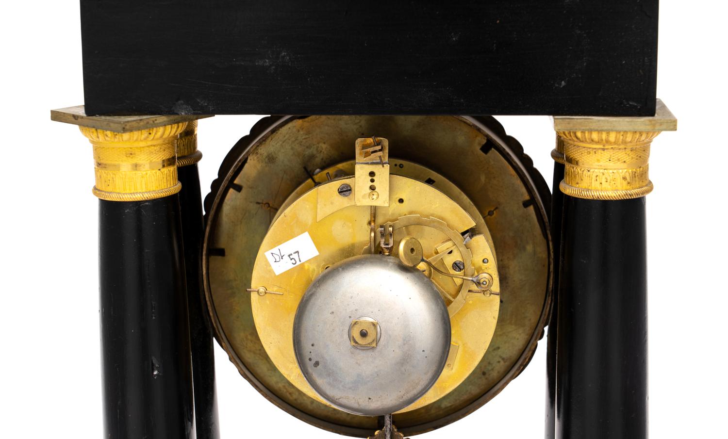 A Charles X Gilt Bronze Mounted Ebonized Fruitwood Clock