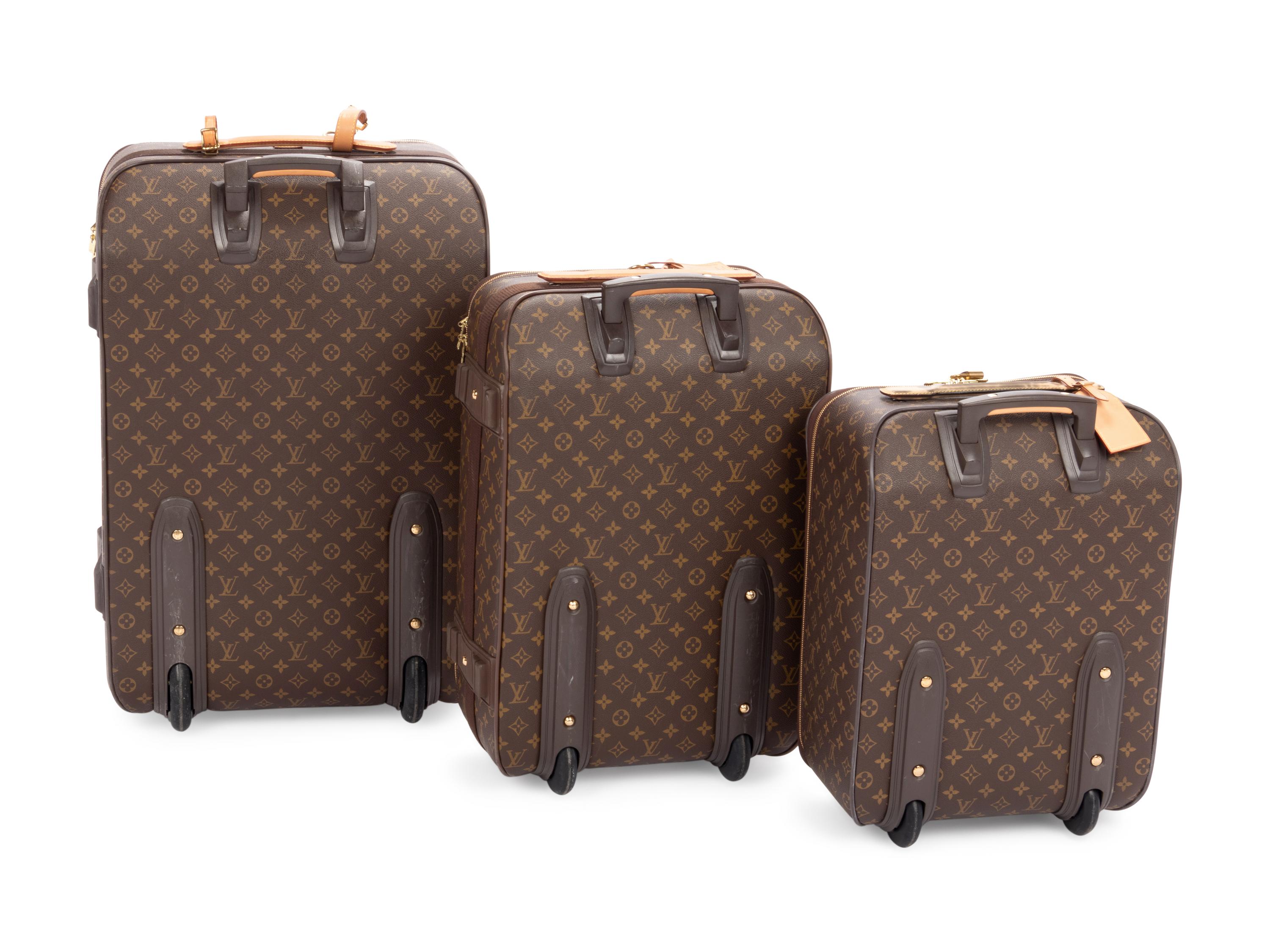 Three Louis Vuitton Monogram Rolling Luggage Pieces, 1990-2000s