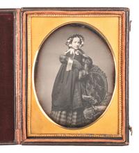 [EARLY PHOTOG] [WHIPPLE, John Adams., attrib.] Quarter plate daguerreotype of a fur-clad young woman