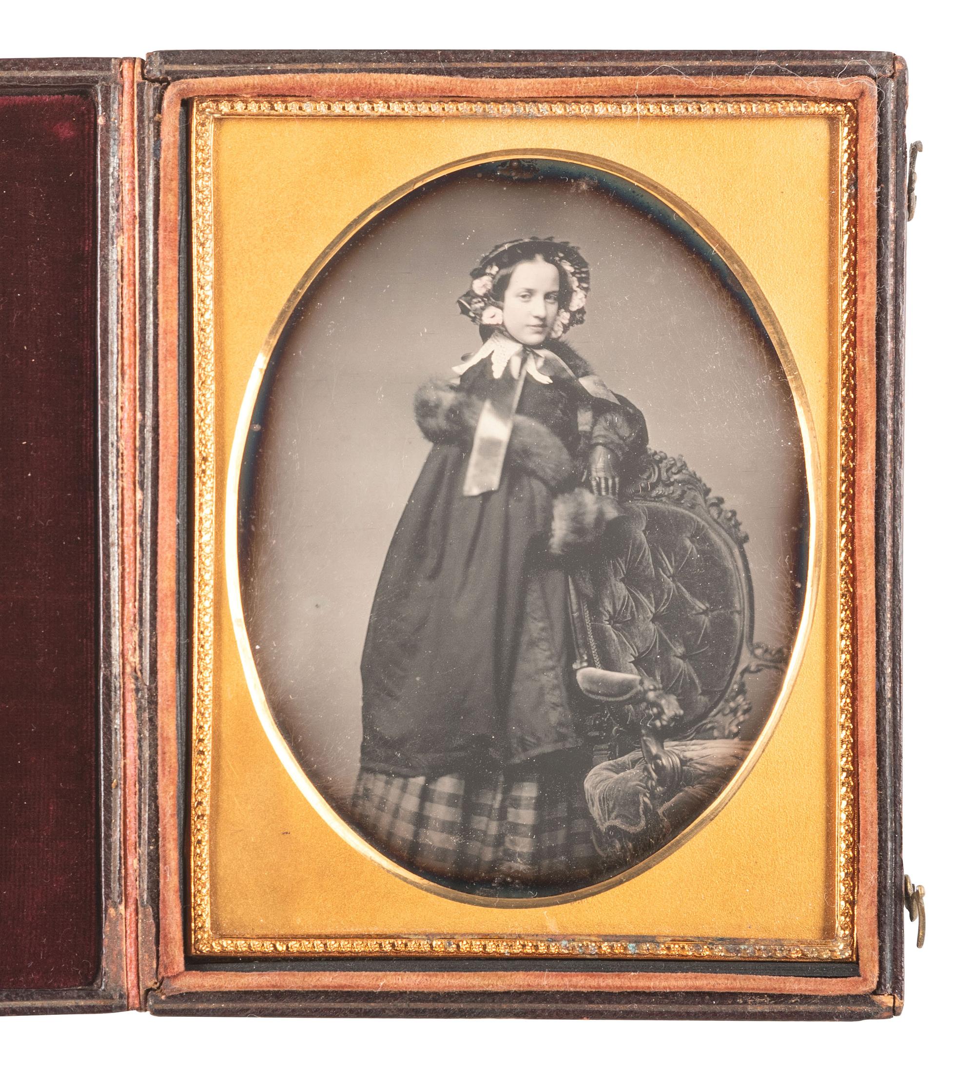 [EARLY PHOTOG] [WHIPPLE, John Adams., attrib.] Quarter plate daguerreotype of a fur-clad young woman