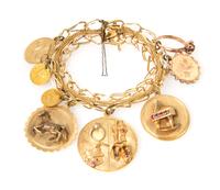 A 14 Karat Yellow Gold Charm Bracelet with Eight Attached Charms, 31.10 dwts.