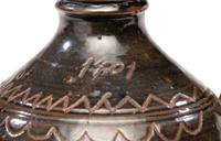 A Potter Ridge Albany Slip-Glazed and Incised Jug
