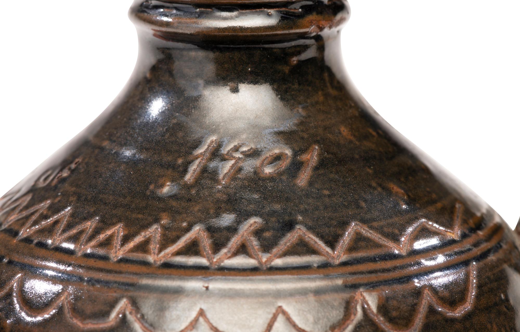 A Potter Ridge Albany Slip-Glazed and Incised Jug