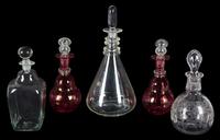 A Group of Five Glass Decanters Height of tallest 13 1/2 inches.