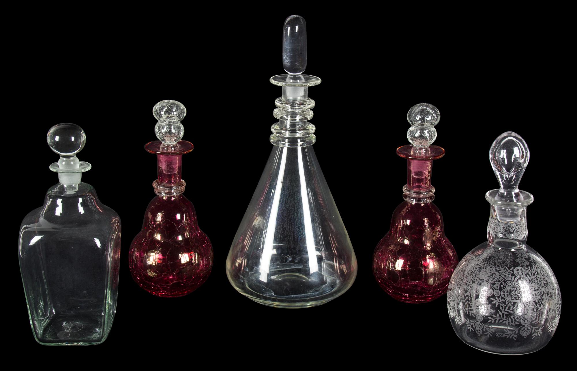 A Group of Five Glass Decanters Height of tallest 13 1/2 inches.