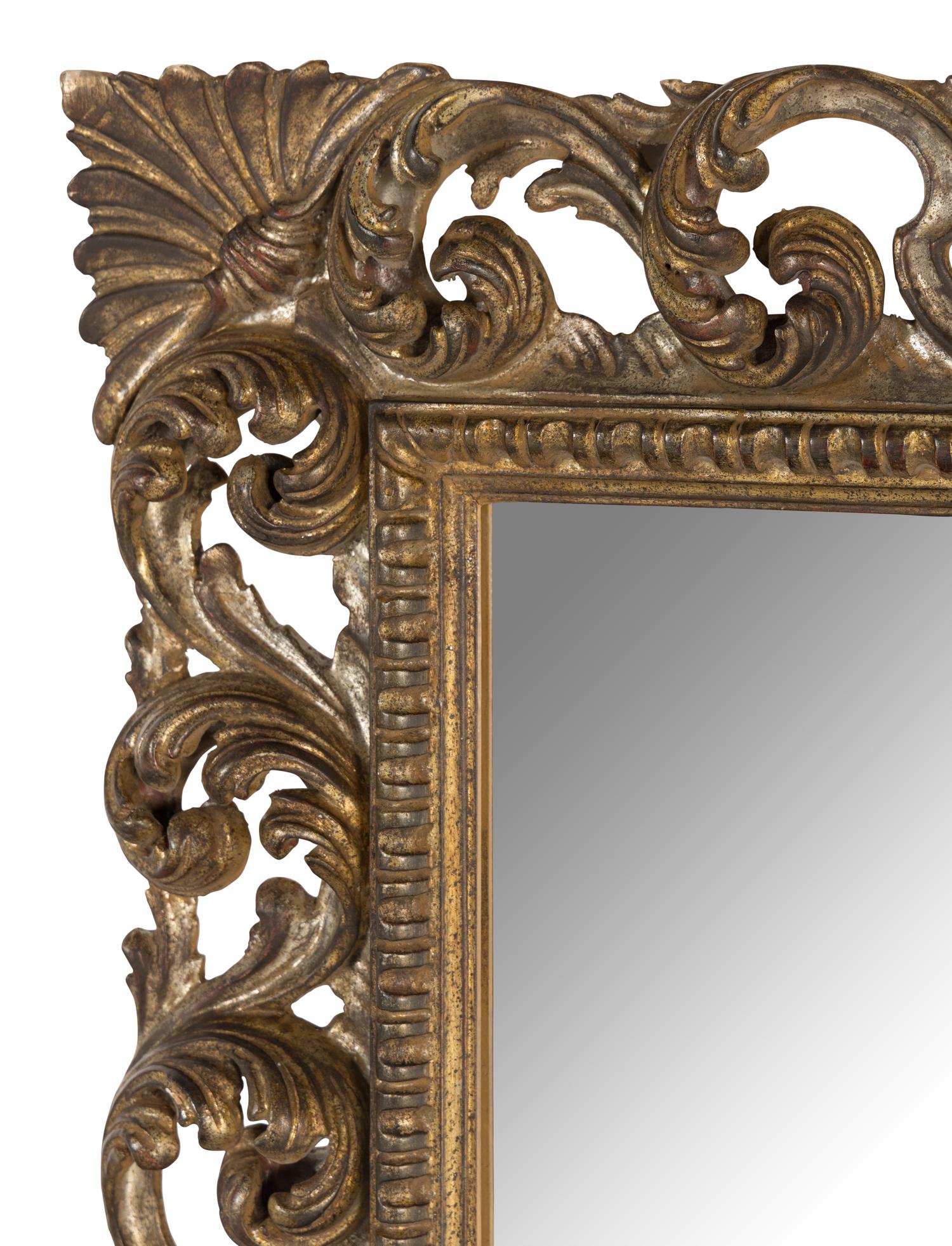 A Large Italian Carved Gilt and Silvered Wood Mirror