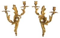 A Pair of Louis XV Gilt Bronze Two-Light Wall Sconces Height 13 1/2 x width 10 1/2 x depth 6 inches. — 19TH CENTURY