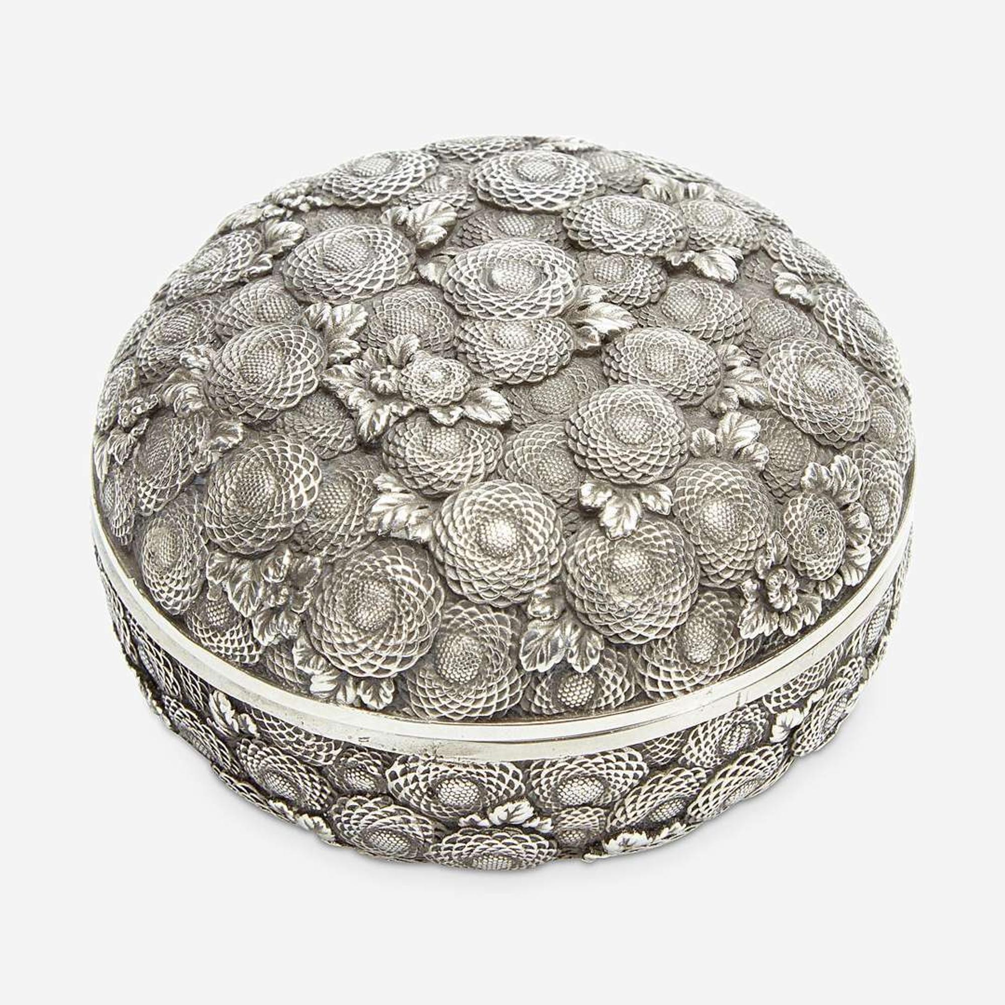 A finely-executed Japanese silver incense box and cover, Kogo