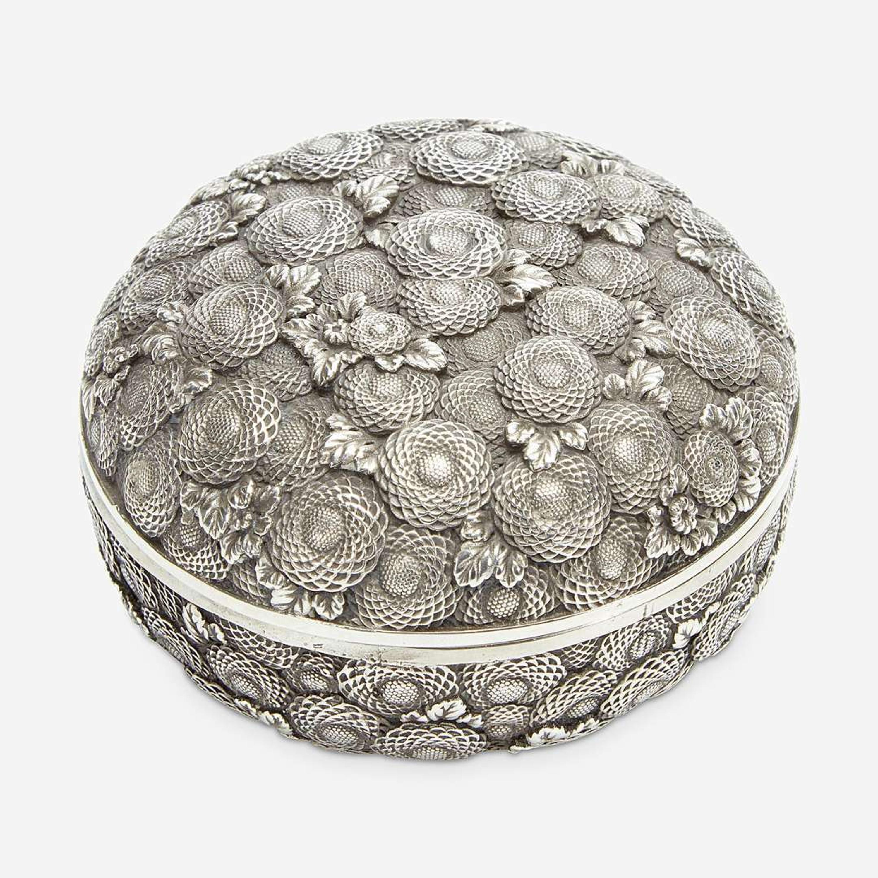 A finely-executed Japanese silver incense box and cover, Kogo