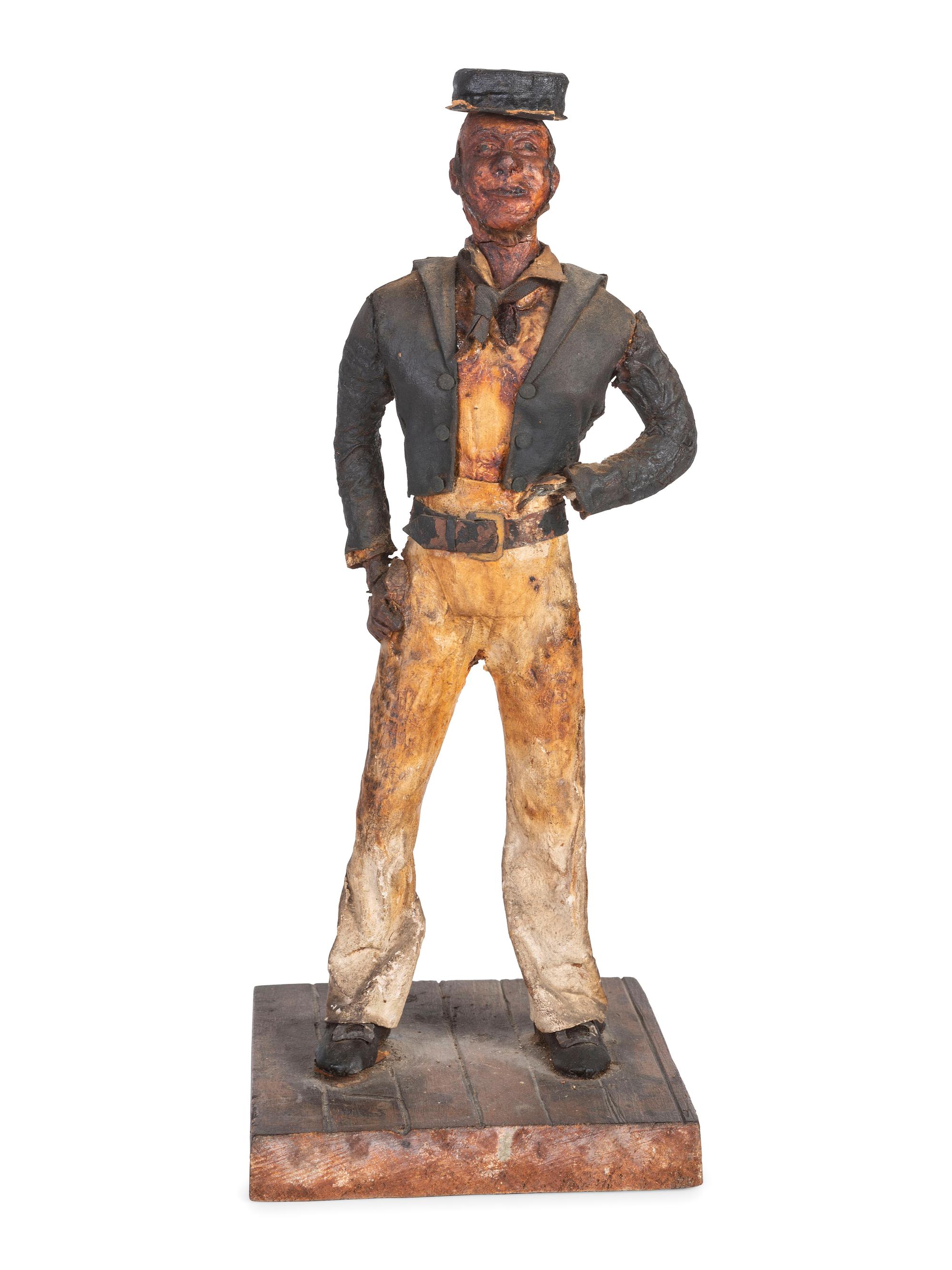 A Carved Wood and Papier-Mache Figure of a Sailor