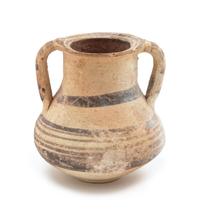 A Mediterranean Terra Cotta Amphora Height 3 3/4 inches.