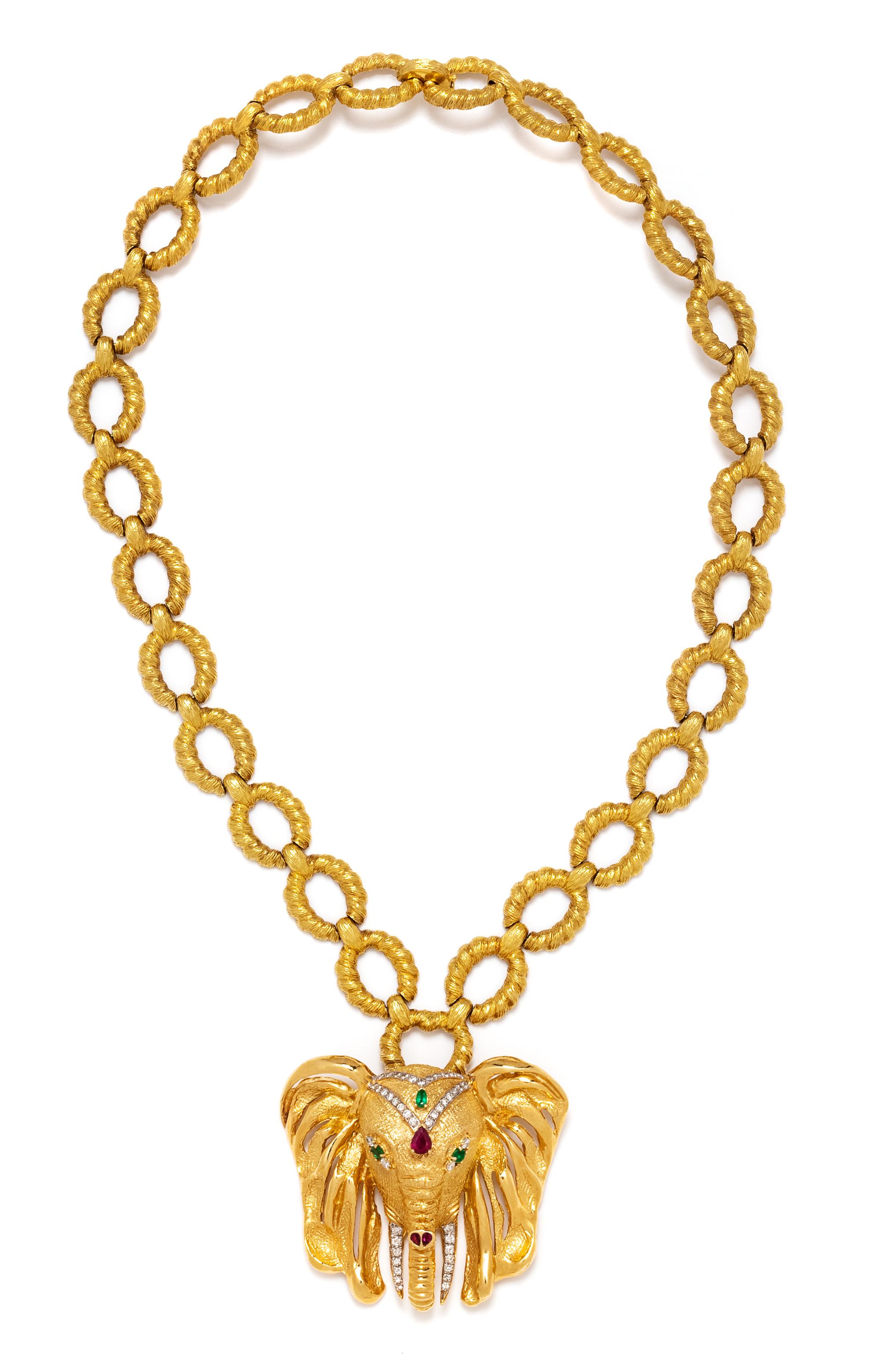 An 18 Karat Yellow Gold, Diamond, Emerald and Ruby Elephant Pendant/Brooch Necklace, 115.40 dwts.