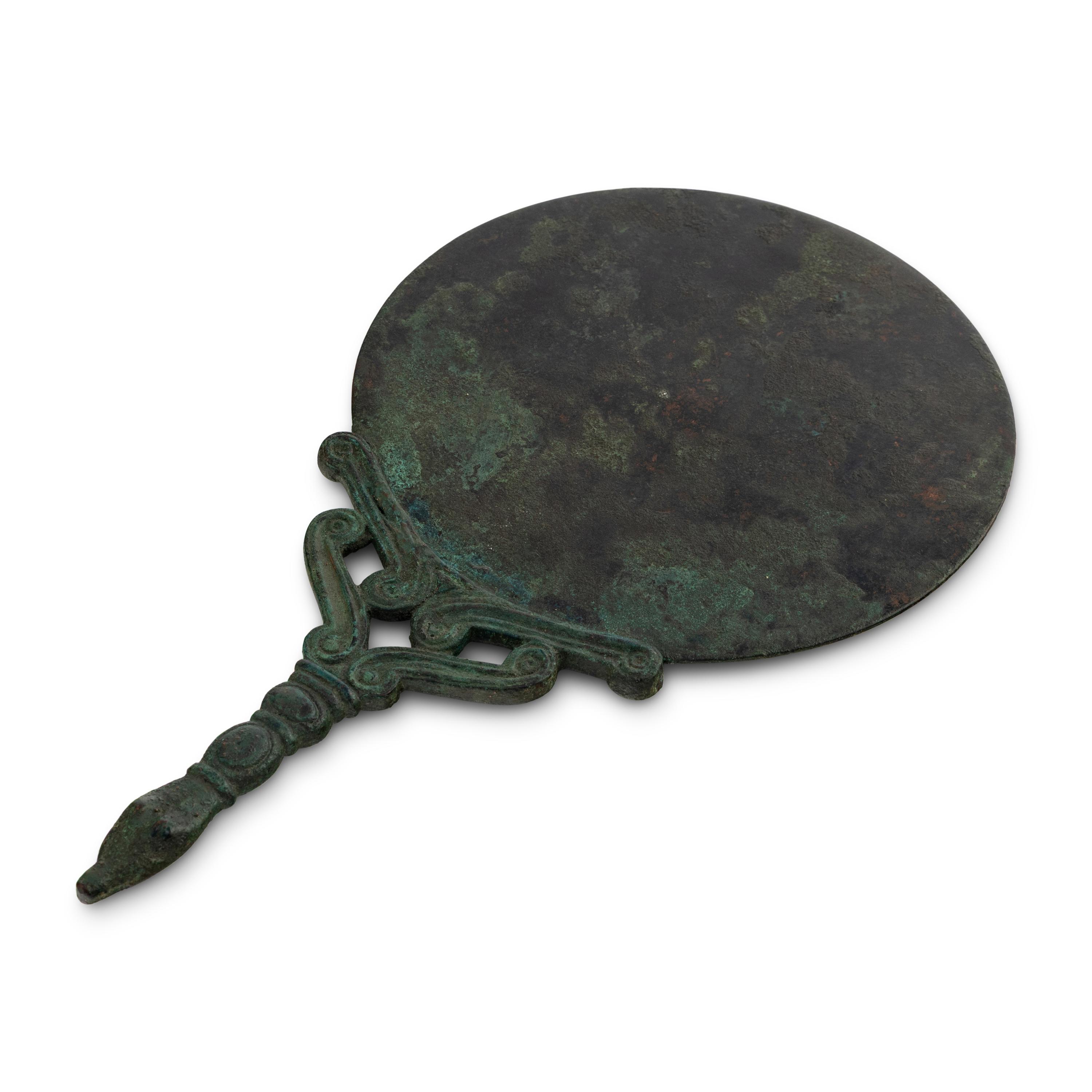 An Etruscan Style Bronze Mirror with Crocodile Handle