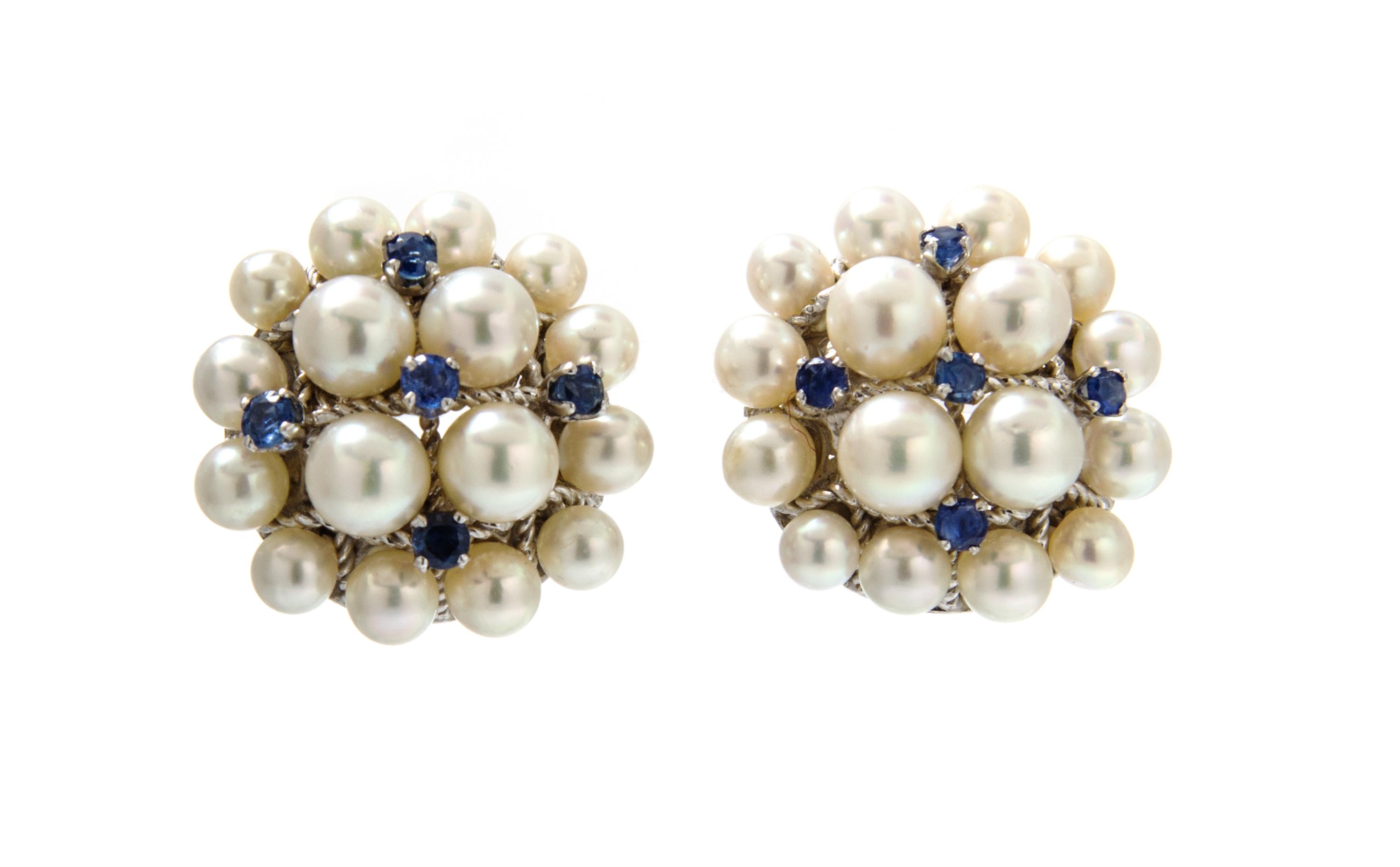 A Pair of White Gold, Cultured Pearl and Sapphire Cluster Earclips, 11.40 dwts.