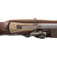 Contemporary Cheekstock Flintlock Rifle with Diana Motifs by John B. Derrick (American, b.1936)