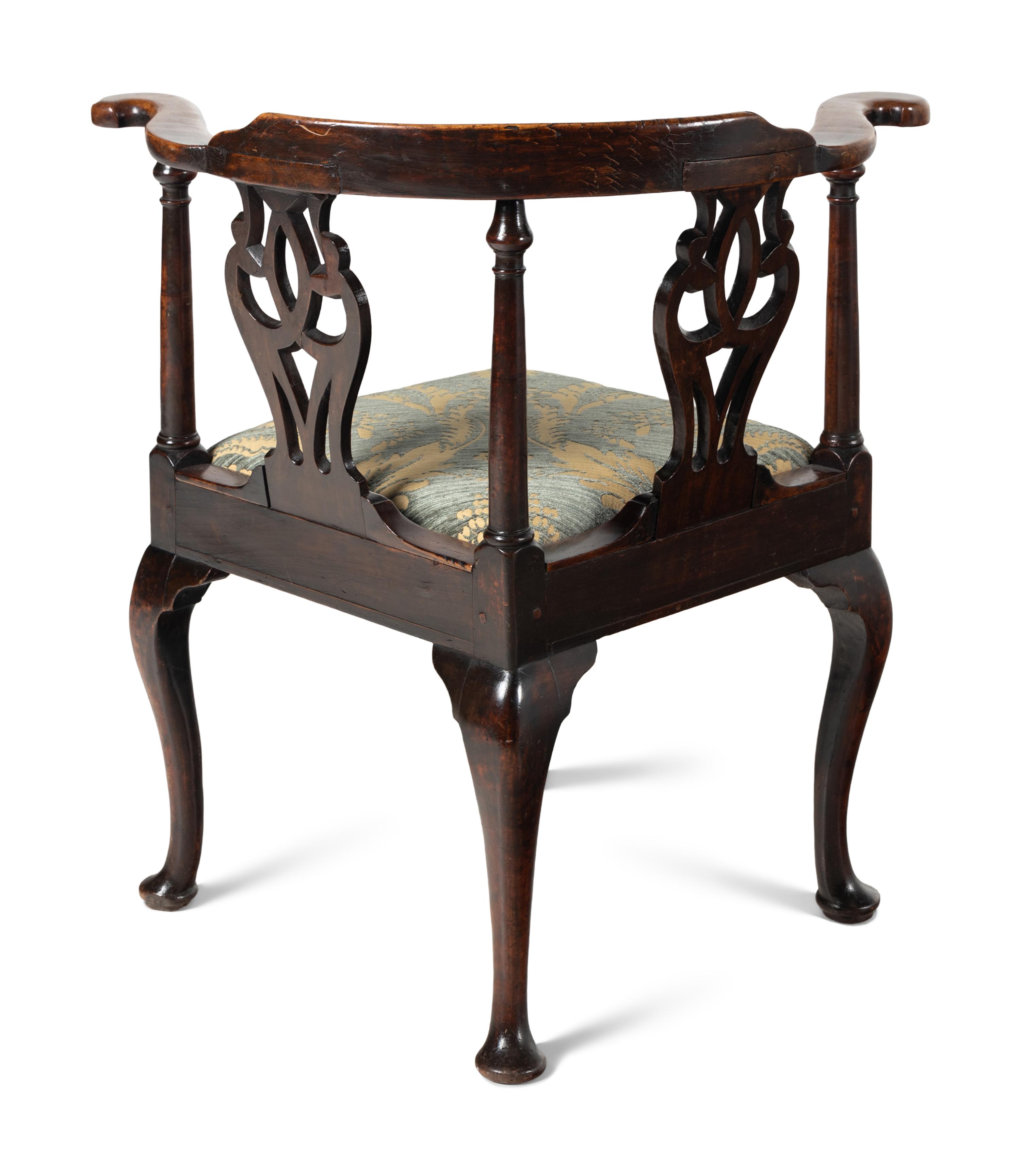 A George III Mahogany Corner Chair