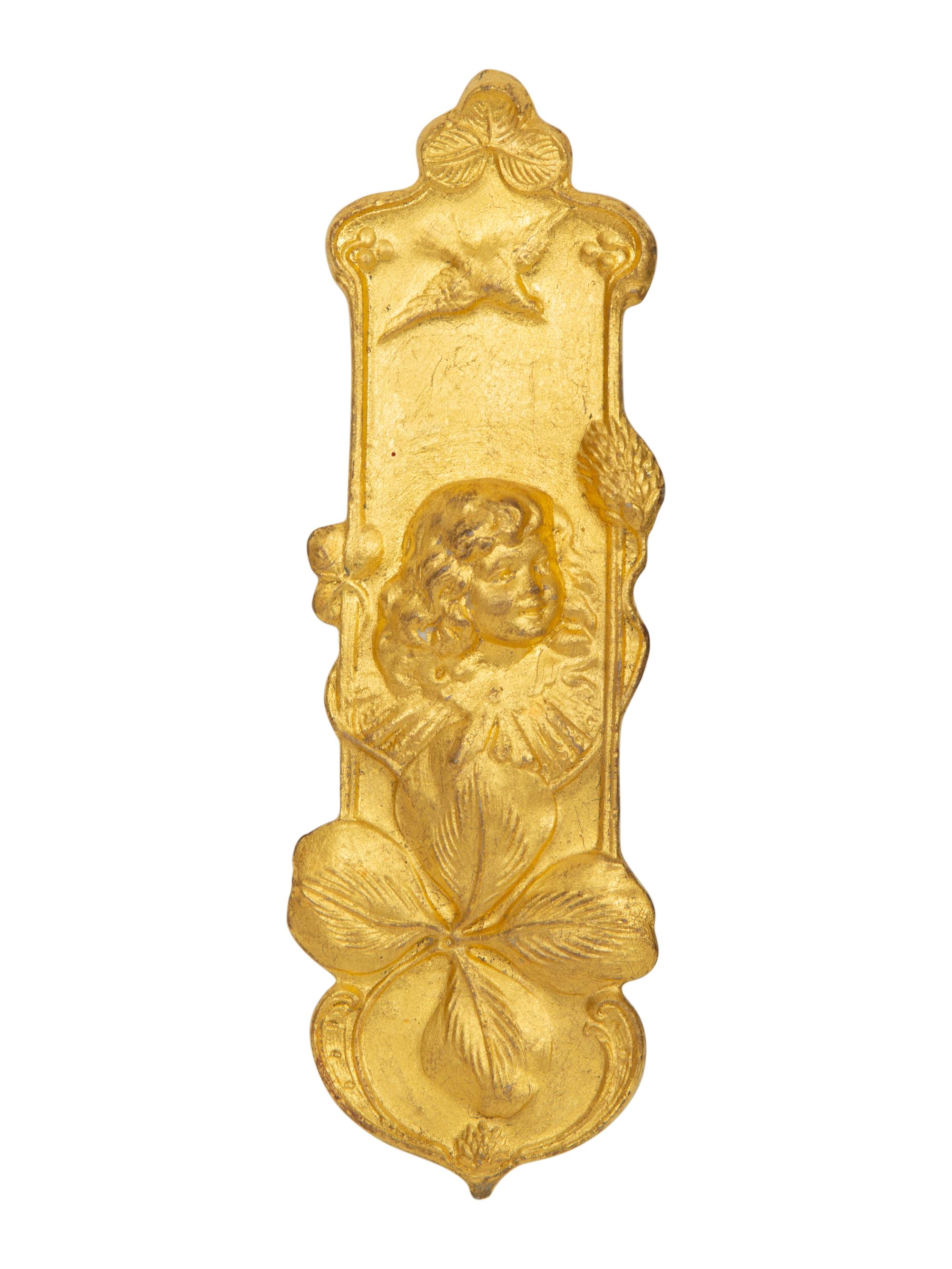 A Group of Three Gilt Wall Plaques