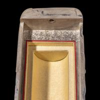 A Chinese Parcel-Gilt Silver Repoussé 'Plantain Leaves' Rectangular Scroll Box, Incised Qianlong Mark 清乾隆乙卯（1796）銀鎏金鏨蕉葉紋手卷機關盒