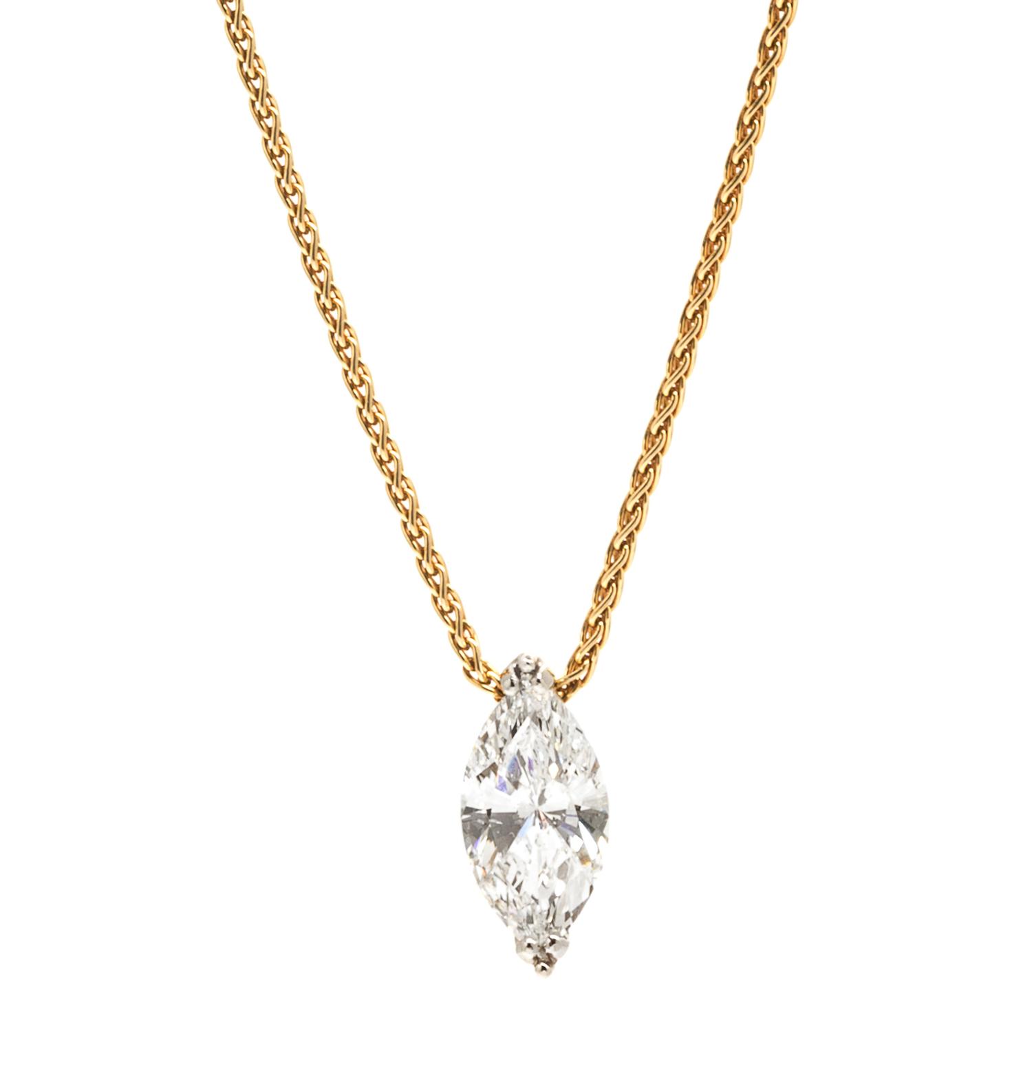 A Platinum and Diamond Pendant, 5.30 dwts.