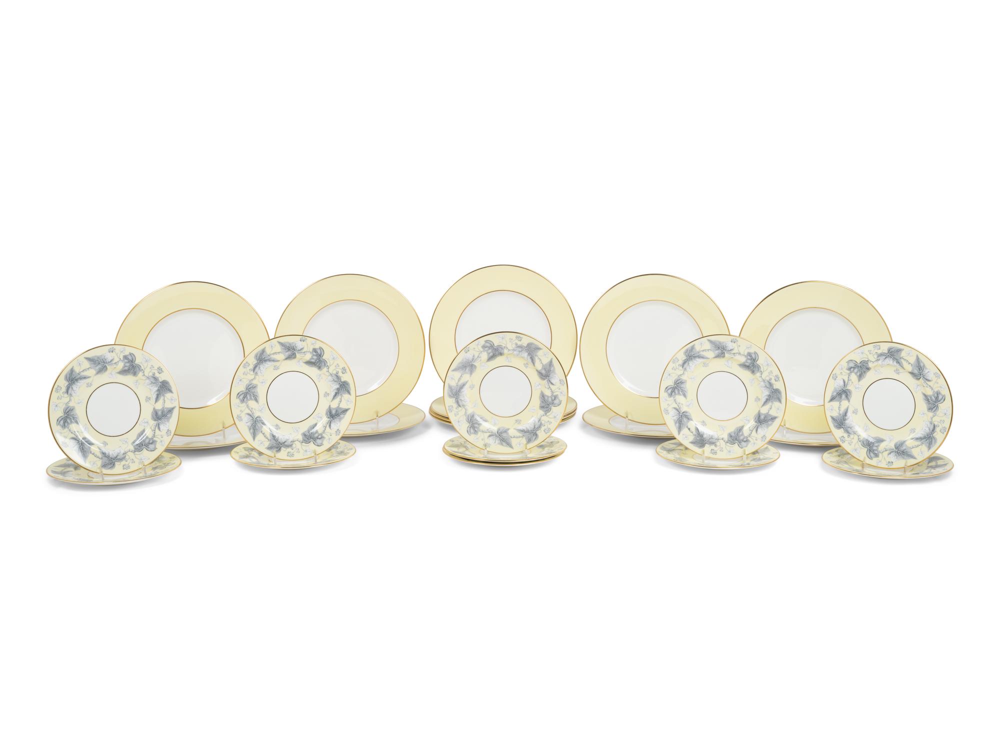 A Set of Twelve Royal Worcester Porcelain Chargers and Eleven Similar Wedgwood Porcelain Salad Plates