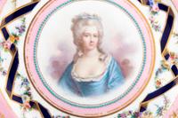 A Set of Twelve Sèvres Style Porcelain Plates Depicting Courtiers