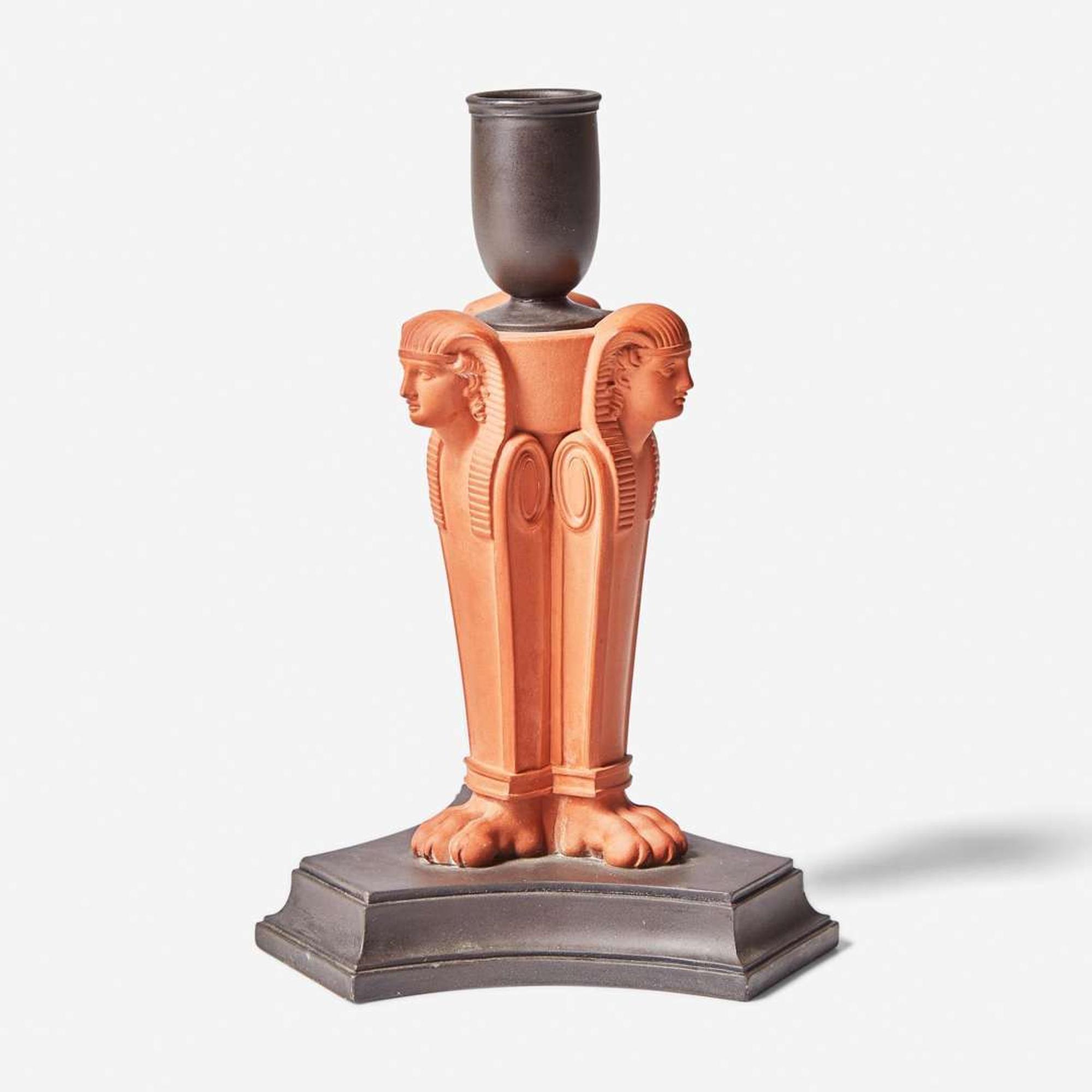 A Wedgwood Black Basalt and Rosso Antico Egyptian Revival Sphinx Monopodia Candleholder UK, early 19th century