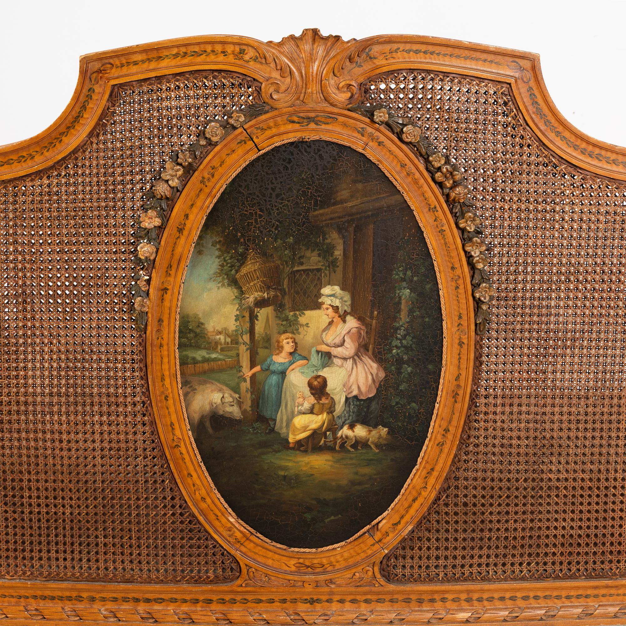 An Edwardian Satinwood and Polychrome Painted Headboard and Footboard