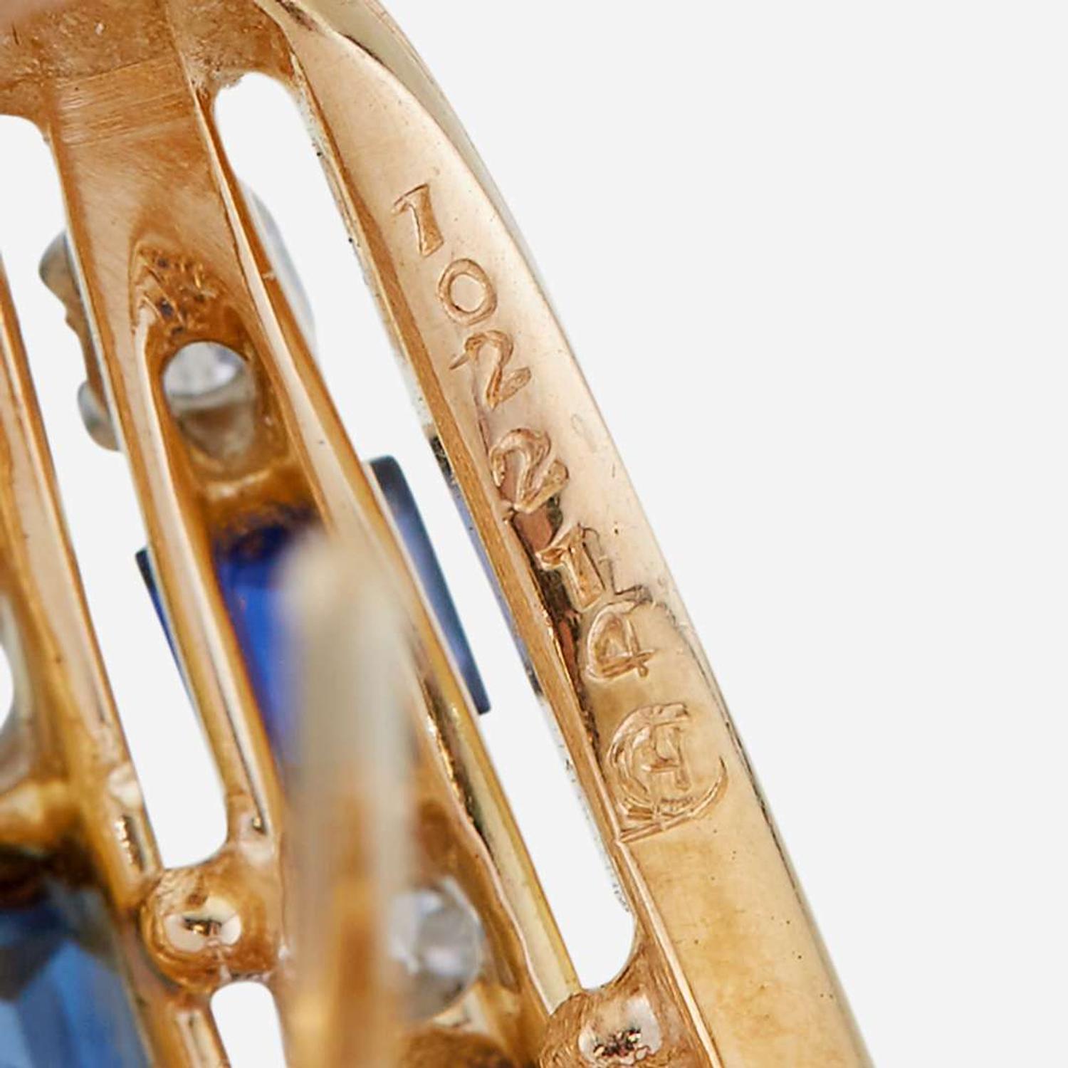 A pair of sapphire, diamond, eighteen karat gold, and platinum earrings, Oscar Heyman