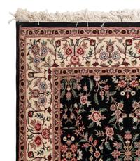 An Indo-Kashan Wool Rug