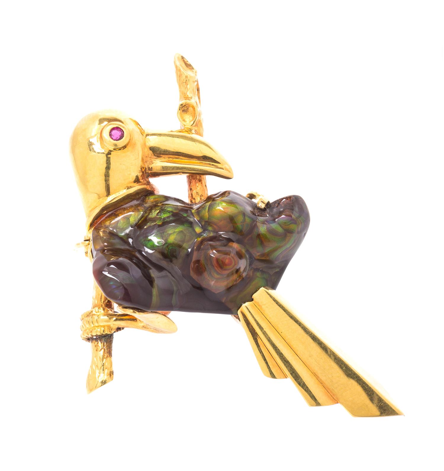 An 18 Karat Yellow Gold, Fire Agate and Ruby Parrot Pendant/Brooch, Ryszard Krukowski, 10.50 dwts.