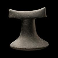 A Polynesian Black-Basalt Poi Pounder