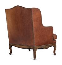 A Pair of Régence Style Leather-Upholstered Wingback Armchairs