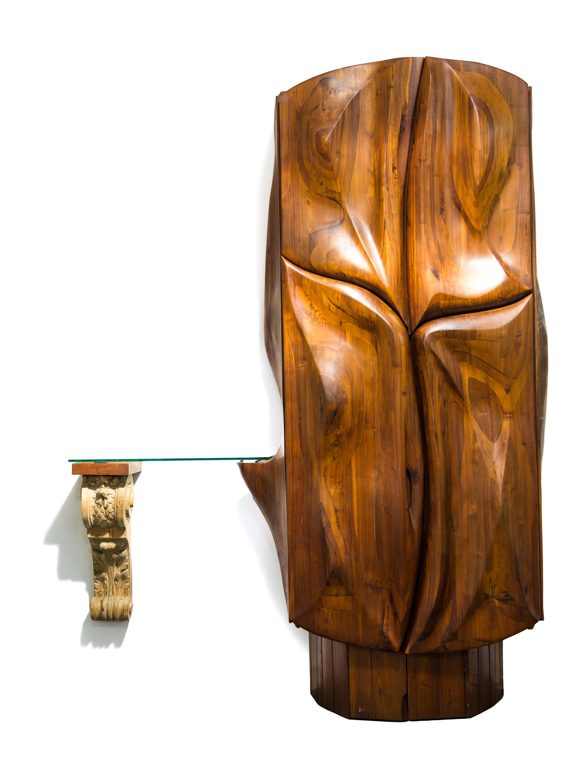 A Laminated and Carved Walnut Bar Cabinet Height 107 x width 86 x depth 25 1/2 inches. — PHILLIP LLOYD POWELL (AMERICAN, 1919-2008)