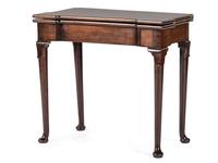 A George III Mahogany Games Table and a Set of Four Queen Anne Style Walnut Dining Chairs