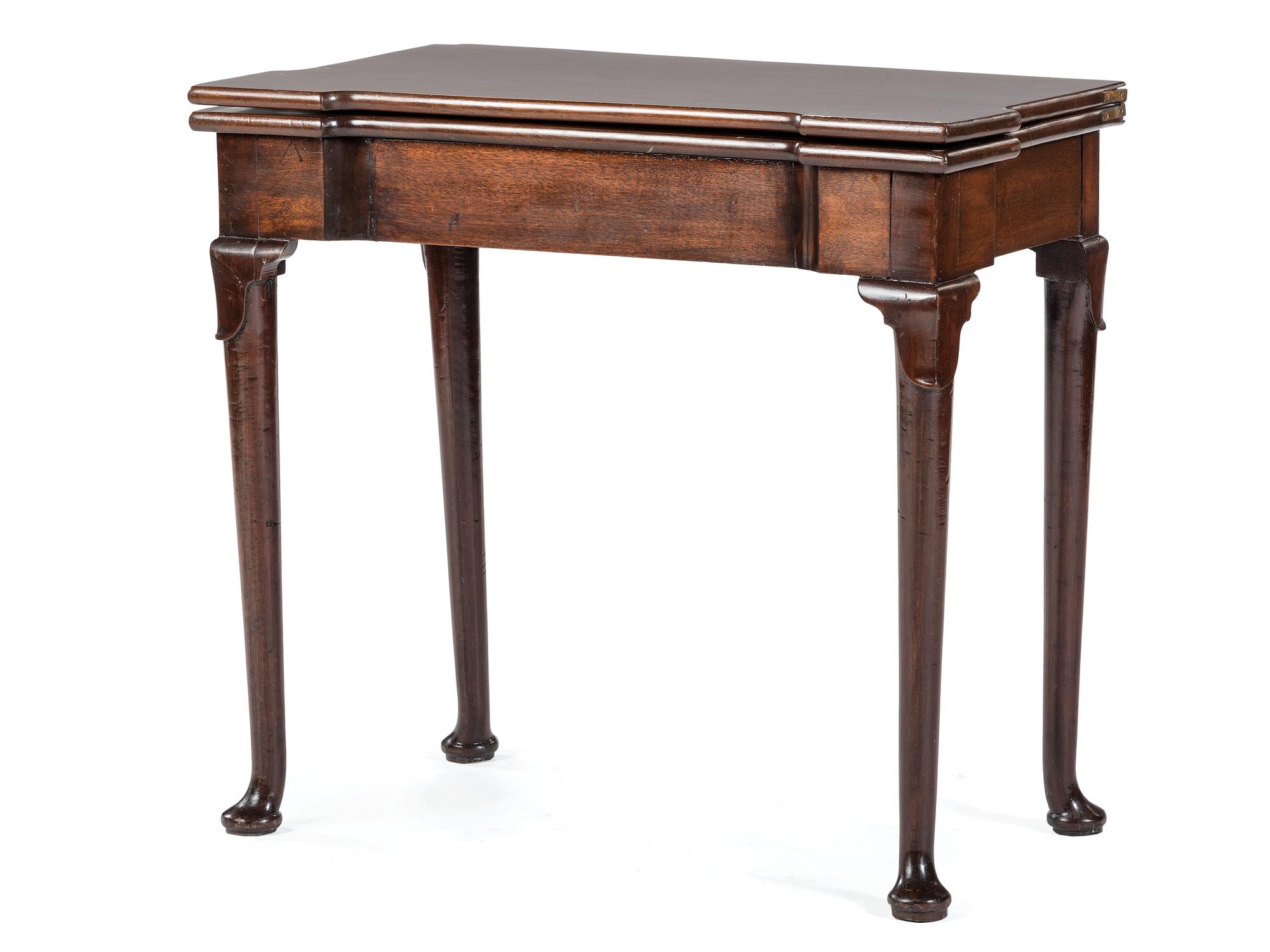 A George III Mahogany Games Table and a Set of Four Queen Anne Style Walnut Dining Chairs