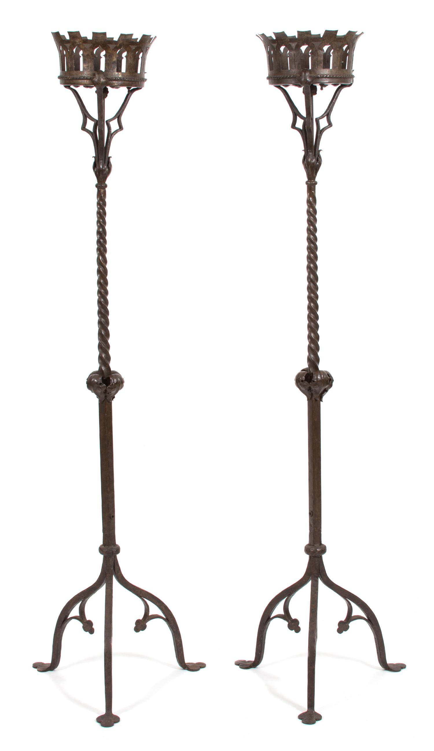 A Pair of Gothic Style Ironwork Torchieres Height 66 inches. — 20TH CENTURY