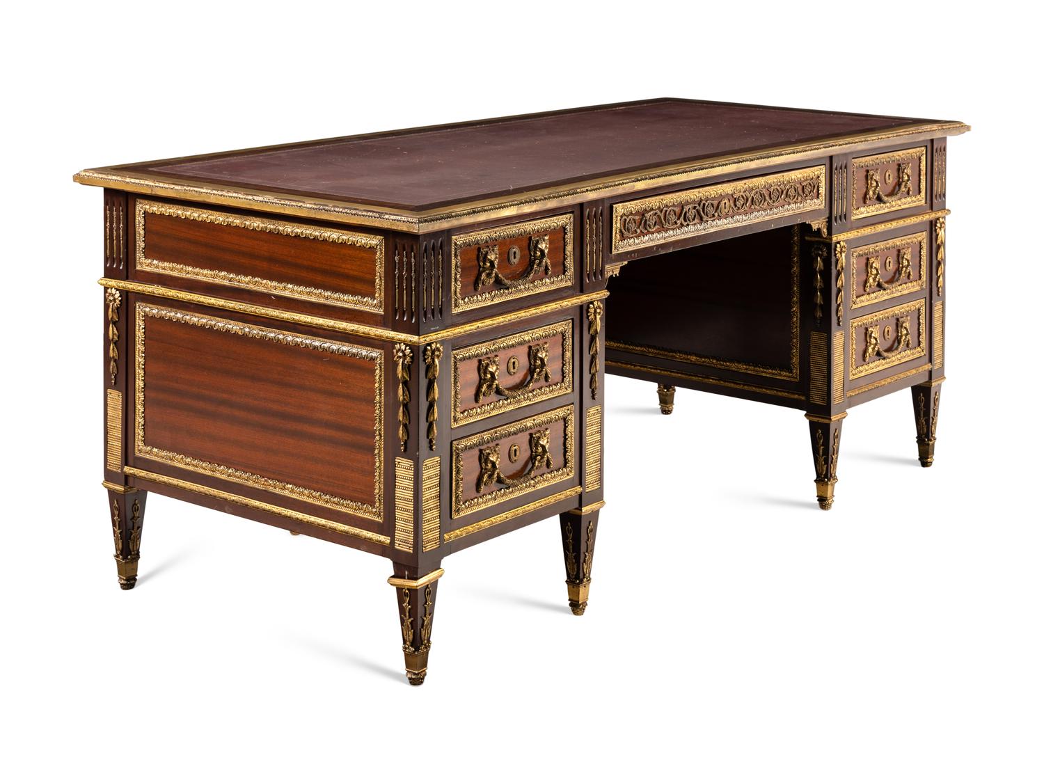 A Louis XVI Style Gilt Bronze Mounted Mahogany Bureau Plat
