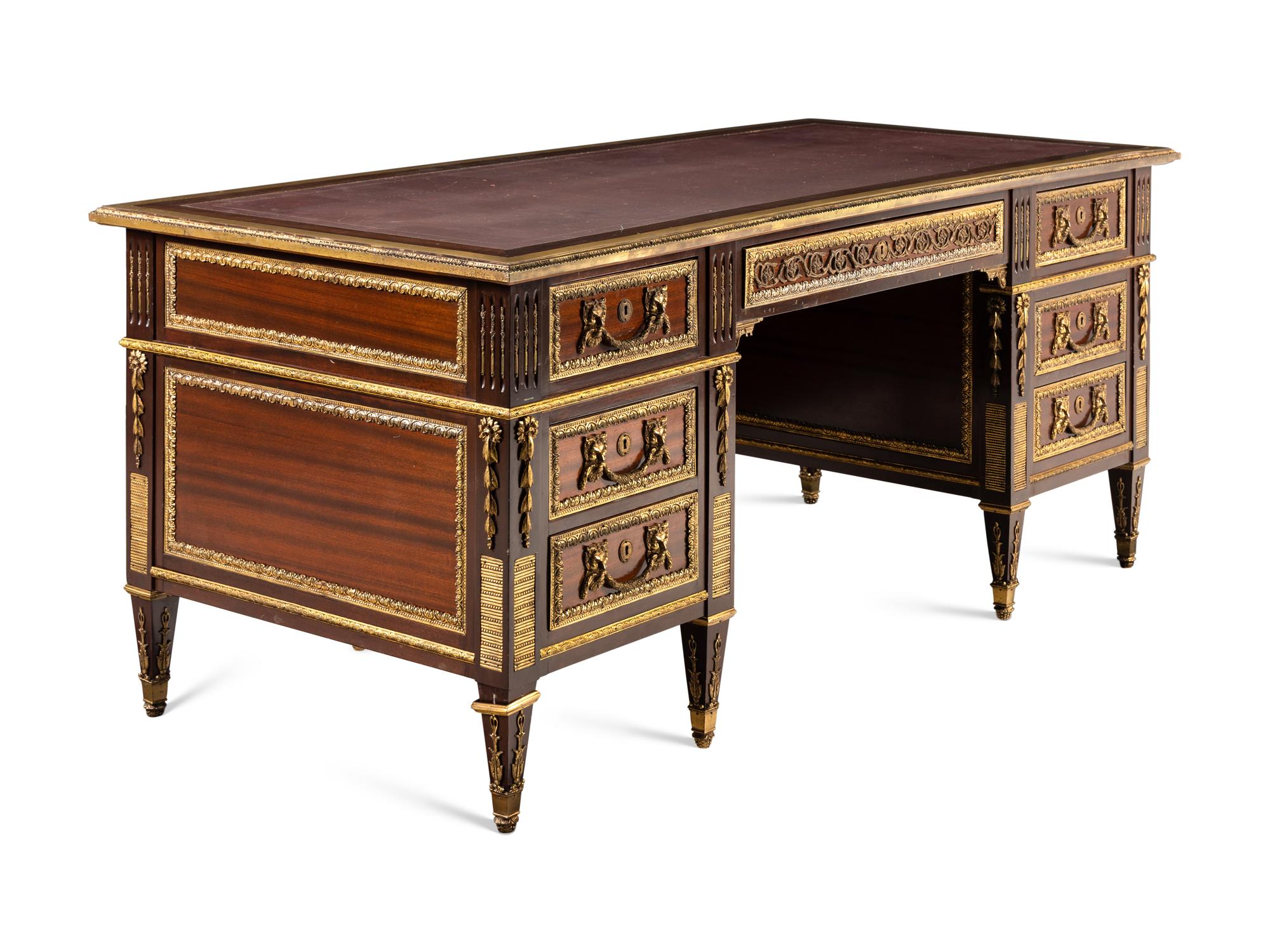 A Louis XVI Style Gilt Bronze Mounted Mahogany Bureau Plat