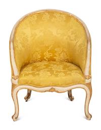 A Louis XV Style Painted and Parcel Gilt Barrel Back Bergere