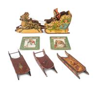 A Bliss Lithograph on Wood Santa on Sleigh and a Santa Claus on a Tin Sleigh