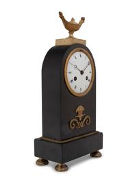 A Directoire Gilt and Patinated Bronze Mantel Clock
