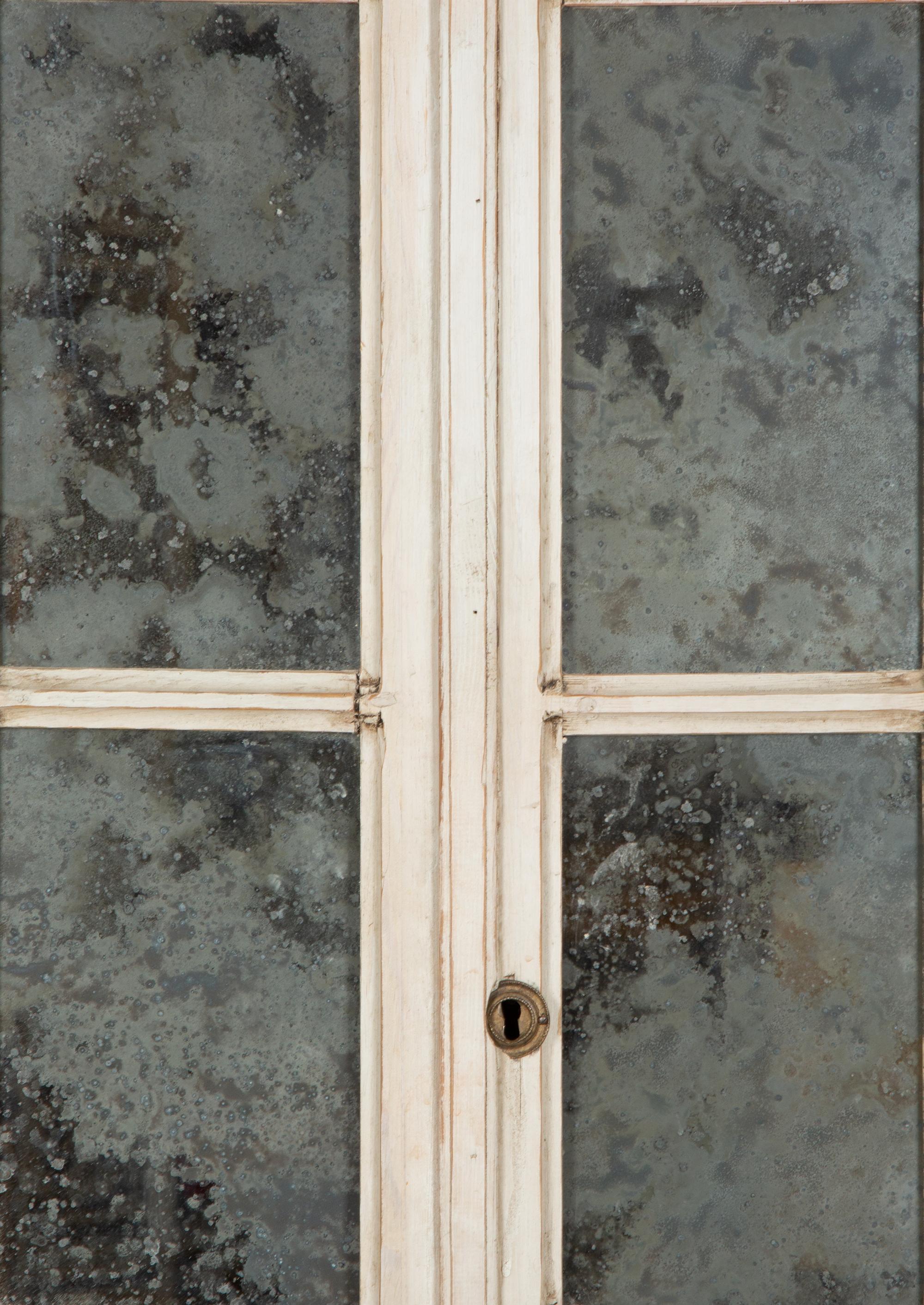 A Gustavian Painted and Mirrored Glass Step Back Cabinet — Late 19th/Early 20th Century
