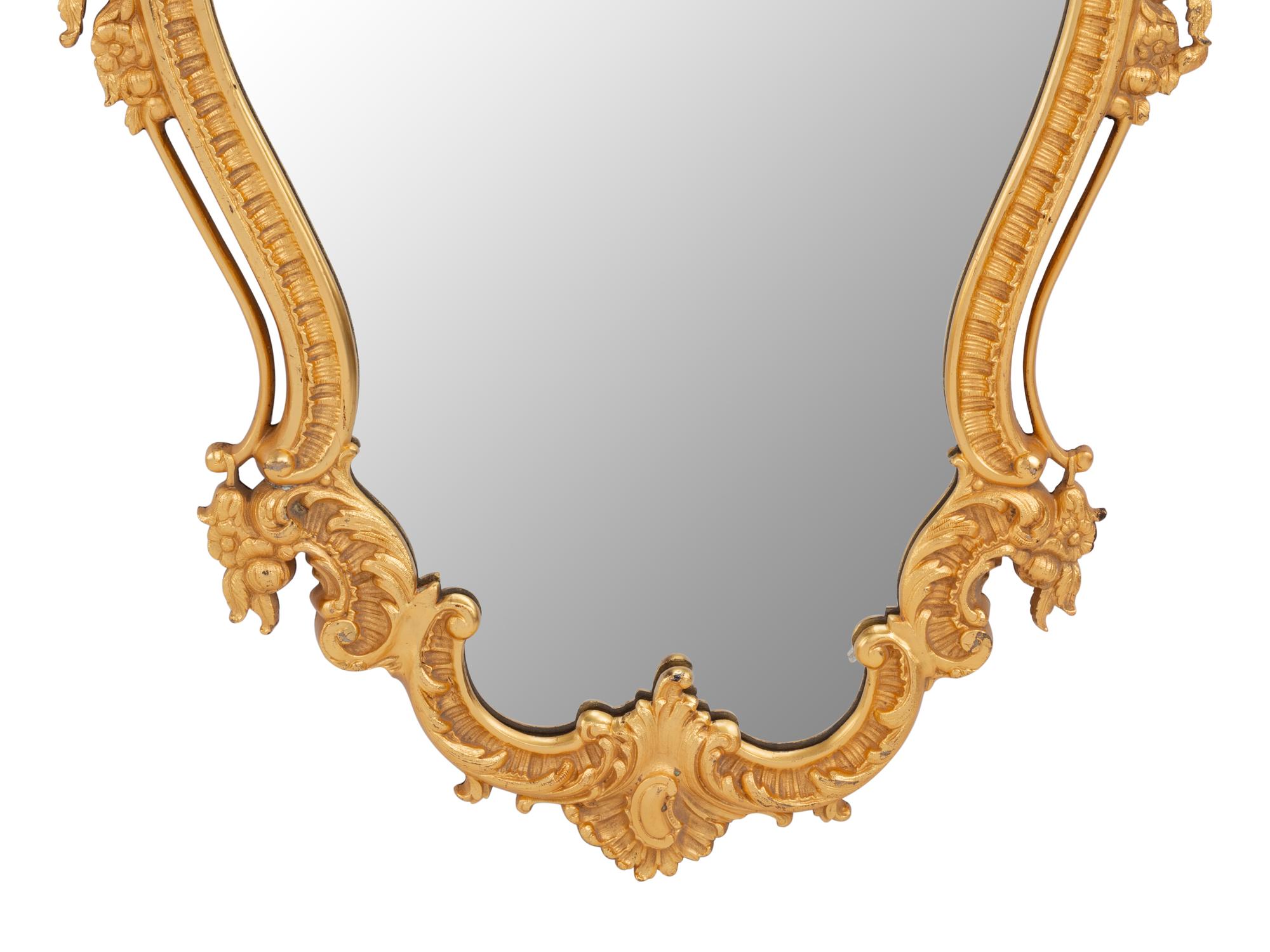 A Pair of Rococo Style Gilt Bronze Mirrors