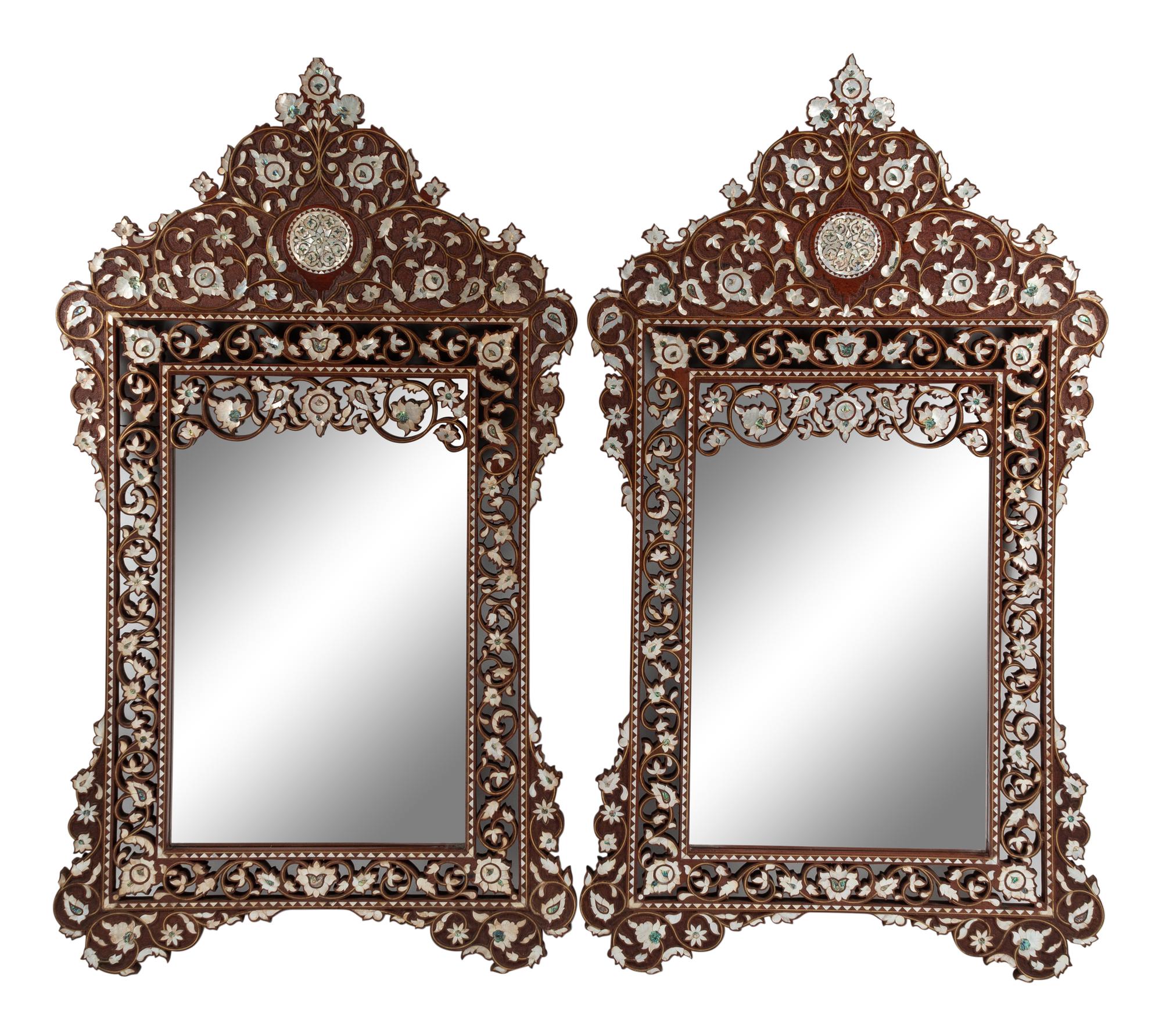 A Pair of Levantine Mother-of-Pearl and Abalone-Inlaid Carved Walnut Mirrors