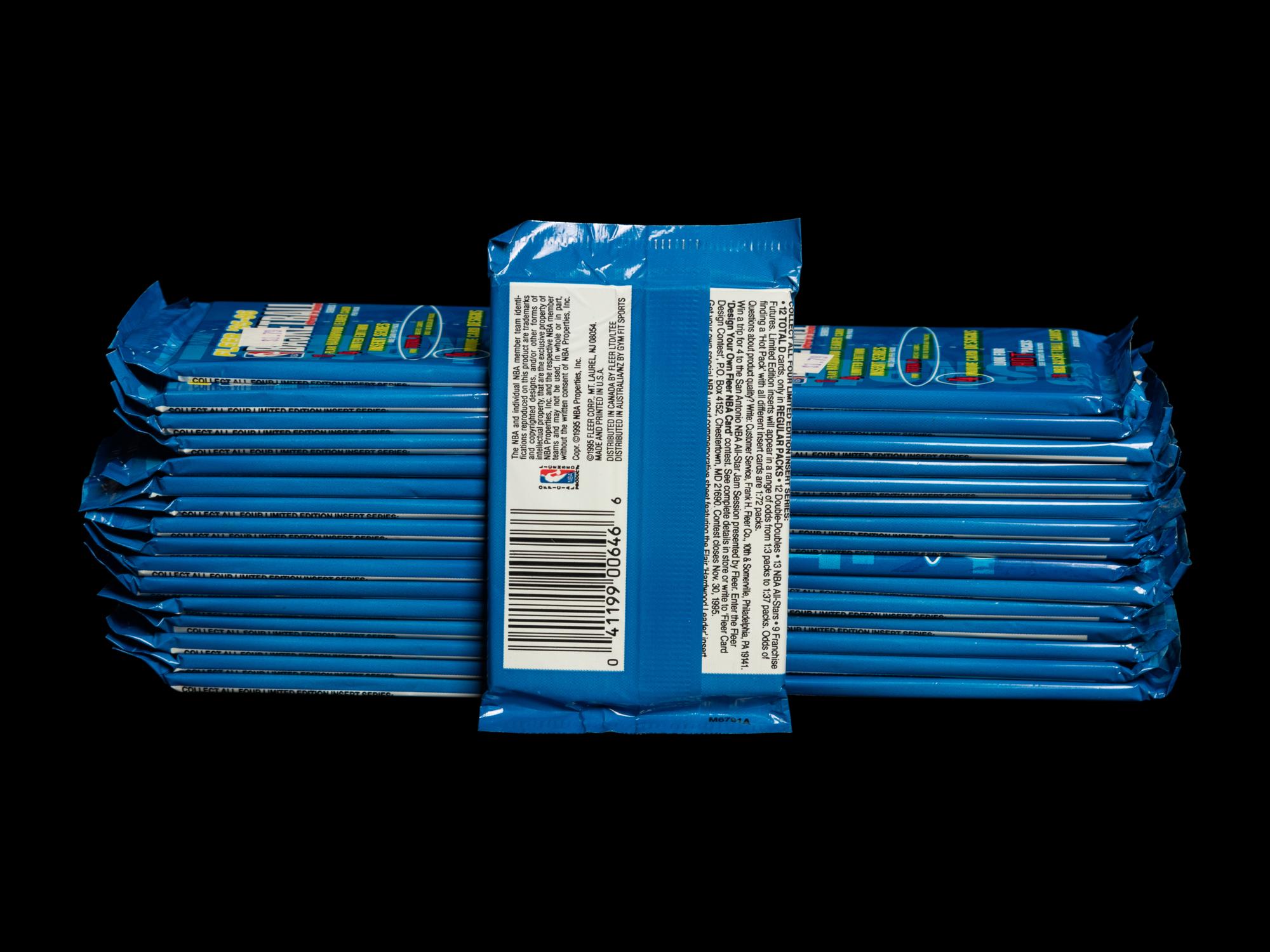 A Group of 32 Packs of 1995-96 Fleer Series One Basketball Cards
